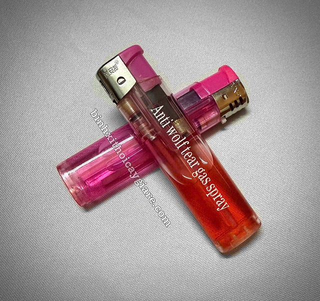 xịt hơi cay bật lửa